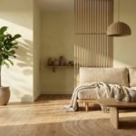 Salon lumineux aux tons neutres avec canapé en lin, table basse en bois, plante verte et décoration naturelle. Ambiance zen.